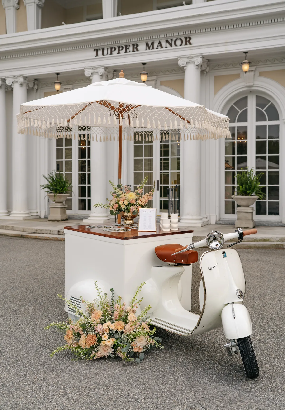 vespa bar delini gelato in from of tupper manor